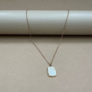 Elegant Gold and White Pendant Necklace